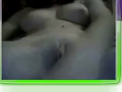 She massages her rock-hard vagina for me in a lazy manner.